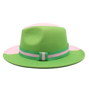 Two-tone wool fedora hat in vibrant green and pale pink for a stylish winter look