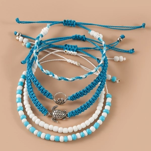 Blue and white woven turtle bracelet set with wave charms and beach beads for women