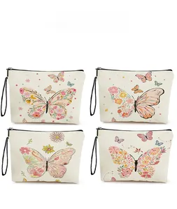 Detailed pattern display of butterfly and floral canvas makeup bags with zippers