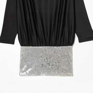 Women's chic black mini dress featuring shimmering silver sequin patchwork design