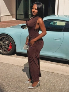Detail of dark brown ruched side texture and slim fit design on a one-shoulder maxi dress