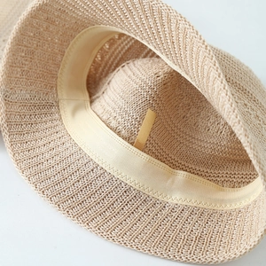 Detail view of the inner adjustable strap and satin sweatband of the wool bucket hat
