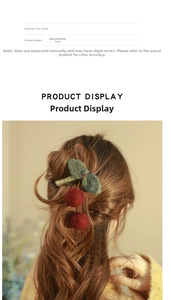 Detail view of 11cm knitted cherry hair claw clip showing felt texture and leaf design