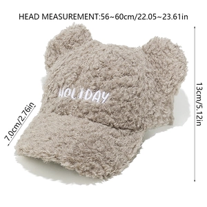 Detail view of plush baseball cap with bear ears and Holiday embroidery plus sizing