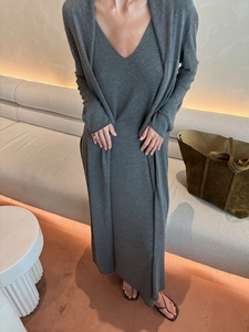Detail showing the fine knitted texture of this dark grey cardigan and maxi dress set