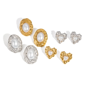 Set of gold and silver stainless steel oval and heart stud earrings with pearls on white background