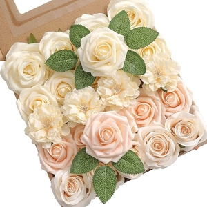 Detailed top view of cream white and champagne foam roses with green leaves in a kraft box