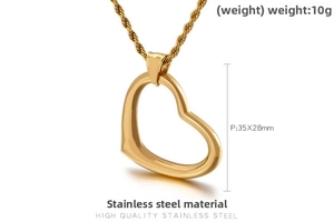 Detail of 35x28mm gold hollow heart pendant and stainless steel twist chain weighing 10g