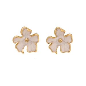 Golden flower earrings with white enamel petals in a minimalist geometric floral design