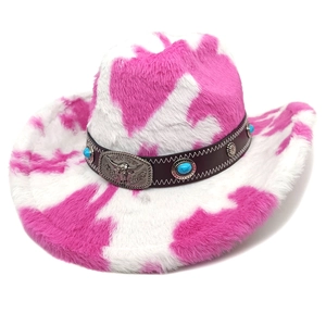 Detail of pink cow print western hat with turquoise beads and bull head ornament