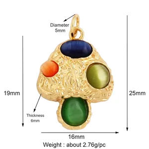 Detailed view of mushroom-shaped copper pendant with colorful cat's eye stone inlay