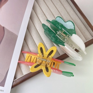 Unique vegetable-shaped acetate hair claws in pineapple and cabbage styles