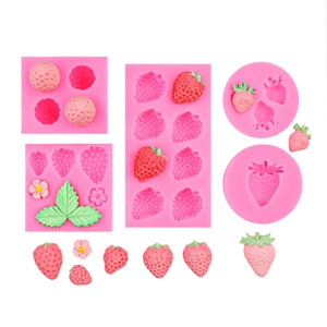 Pink silicone mold set for creating realistic strawberries, raspberries, and leaf shapes