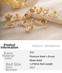 Makroaufnahme von Titanstahl-Labret-Steckern mit Zirkon-Schmetterlingen und Augen-Designs