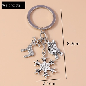 Christmas keychain details with elk, snowman, and snowflake charms, 8.2cm total length