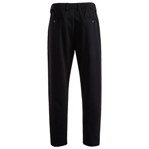 Detail of men's casual pants showing elastic waist with belt loops and textured fabric