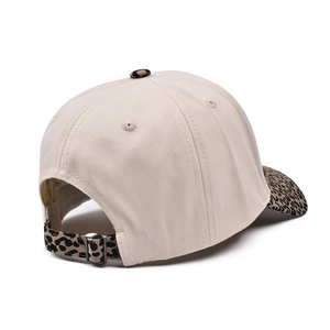 Beige baseball cap with leopard print brim and adjustable back metal buckle strap