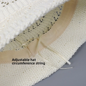 Detail of breathable knit sun hat featuring adjustable inner drawstring for custom fit
