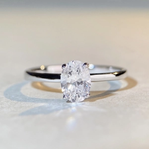 Elegant S925 sterling silver ring with oval cut high carbon diamond and minimalist band