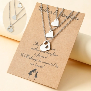 Set of three stainless steel heart necklaces for mother and daughters on display card