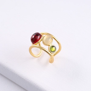 Golden multi-layer open ring featuring red, white, and green crystal gemstones