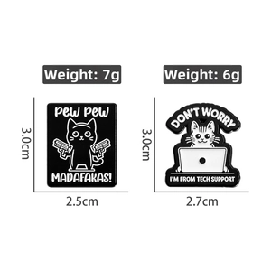 Detail view of funny cat enamel pins with humorous text on a clean white background