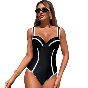 One-piece swimsuit in black with white contrast piping and flattering slim-fit silhouette