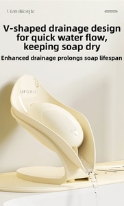 Detail of V-shaped drainage soap dish in cream white showing self-draining water flow