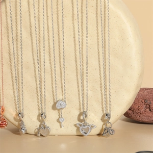 Silver love heart pendant necklaces featuring Together Always engraving and angel wings