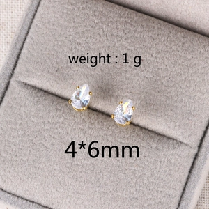 Detail view of water drop zircon earrings in a velvet box with 4x6mm size detail