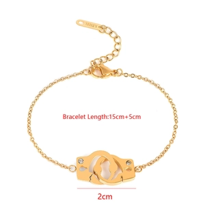 Detail of gold stainless steel handcuff bracelet with crystals and 15cm+5cm extension chain