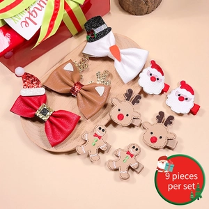 9-piece set of Christmas hair clips featuring Santa, reindeer, and gingerbread man themes