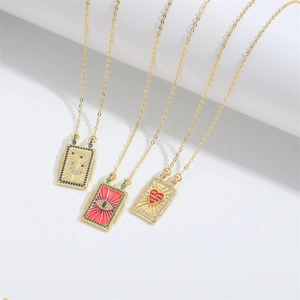Three gold-plated necklaces with evil eye and heart pendants for elegant women's jewelry