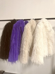 Short faux fur coat detail showing purple black beige and white color variants