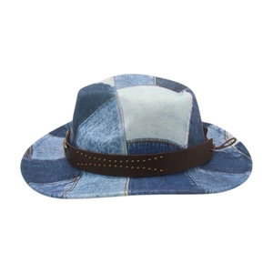 Detail of western patchwork denim cowboy hat with leather band and metal rivets