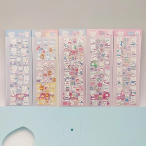 Detailed close-up of 5 cute holographic rabbit stickers for DIY scrapbooking and decoration