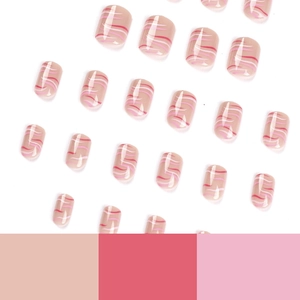Short round pink press-on nails with wavy stripe patterns and a glossy finish