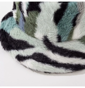 Detail shot of the thick zebra pattern faux fur texture on this winter bucket hat