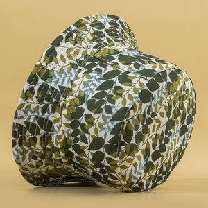 Reversible bucket hat with green leaf print for beach sun protection and casual wear