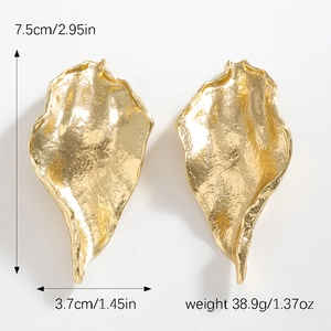 Detailed view of large gold-tone hammered leaf earrings with measurements and weight specs