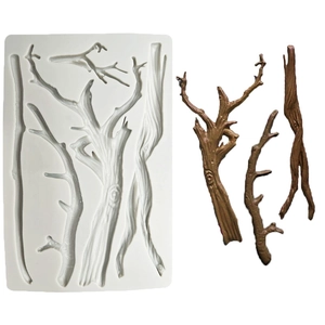 Detail view of branch-shaped silicone mold with finished brown tree branch crafts