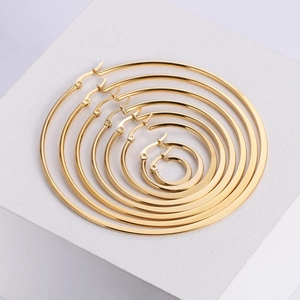Set of six polished gold titanium steel hoop earrings in varying sizes for women