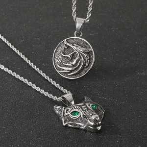 Viking wolf pendant necklace in stainless steel with green eyes and moon star engraving