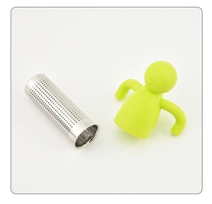 Detail of green silicone humanoid tea infuser with stainless steel cylinder filter