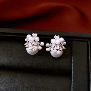 Vintage 18K gold plated pearl stud earrings with zircon crystals in a luxury jewelry box