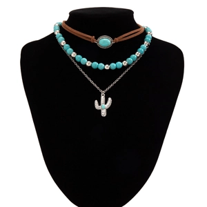 Bohemian multilayer necklace set with turquoise stone pendant and cactus charm detail