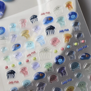 Detailed macro view of 3D jellyfish resin stickers with colorful embossed textures
