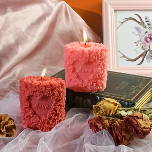 Embossed rose aromatherapy candle with Love heart carving in pink and red colors