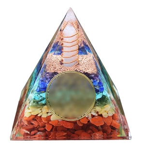 Handcrafted orgone pyramid with healing crystals and copper coil for home office decor