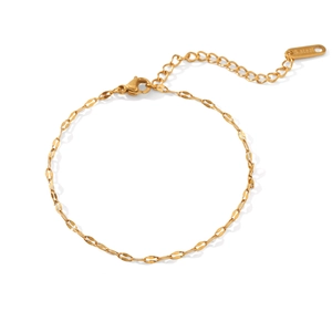 Detail of gold stainless steel link bracelet featuring a secure lobster clasp and extension